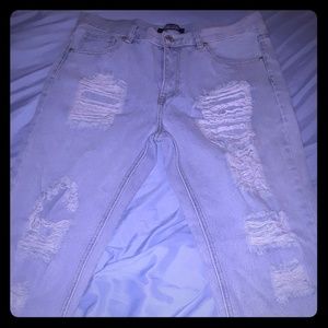 Light blue ripped jeans